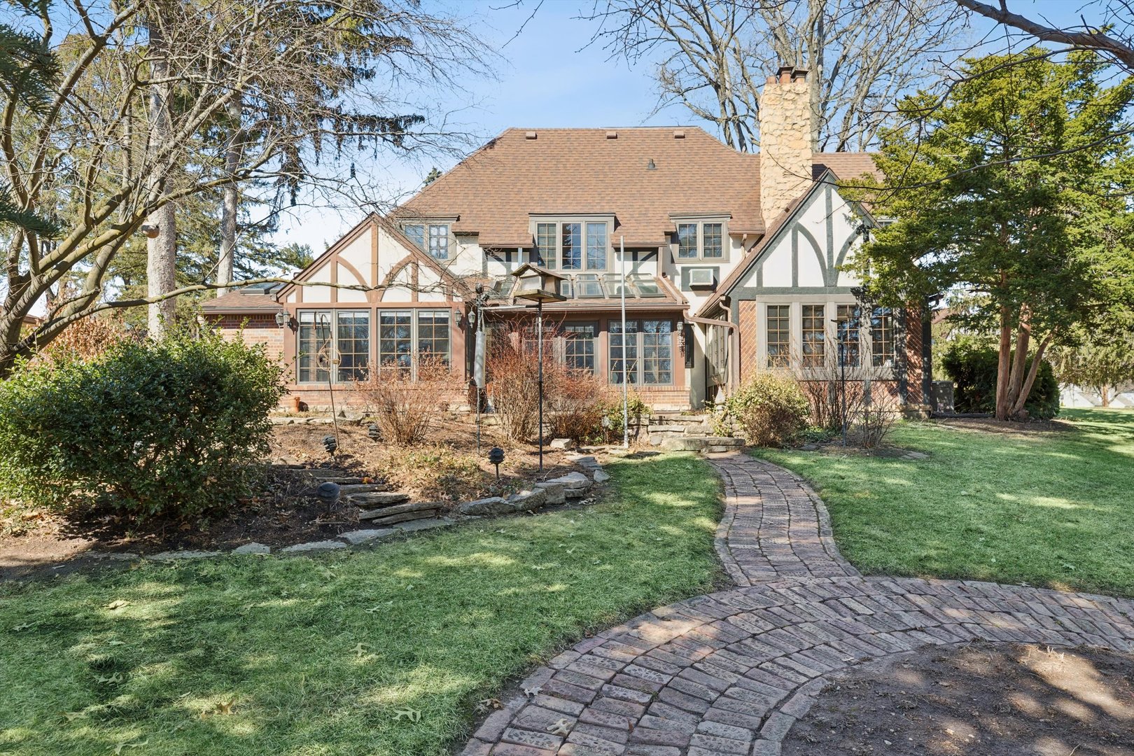716 Terrace Drive Clinton, IA 52732 - Photo 4 of 78 a front view of a house with a yard table and chairs