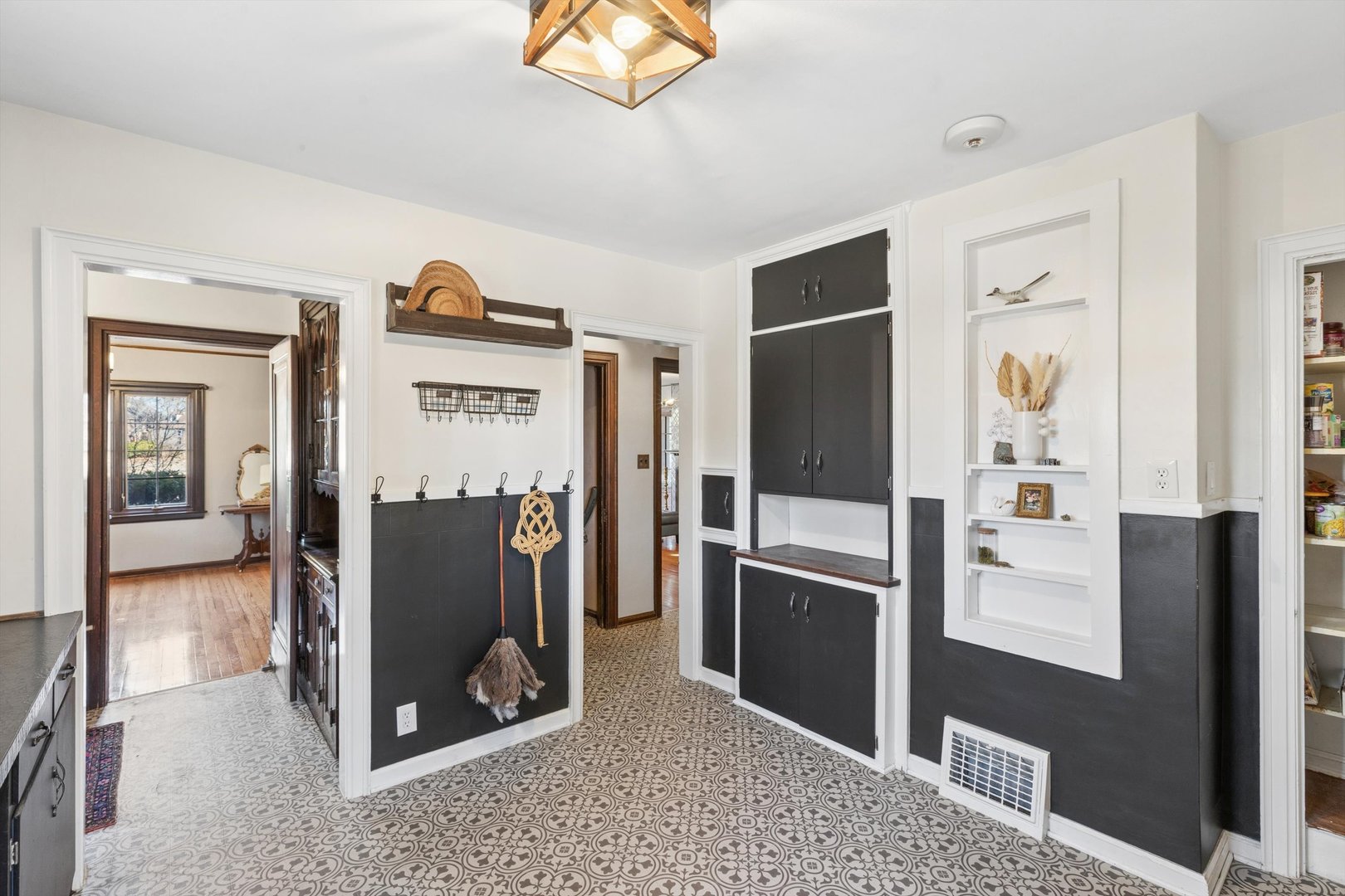 716 Terrace Drive Clinton, IA 52732 - Photo 46 of 78 a view of a kitchen with refrigerator and mirror