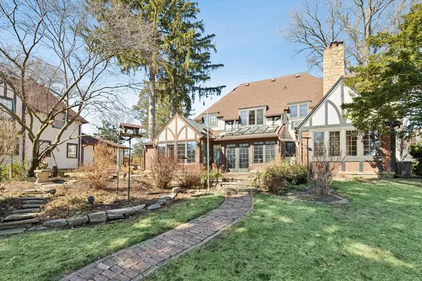a view of a yard with snow in front of it