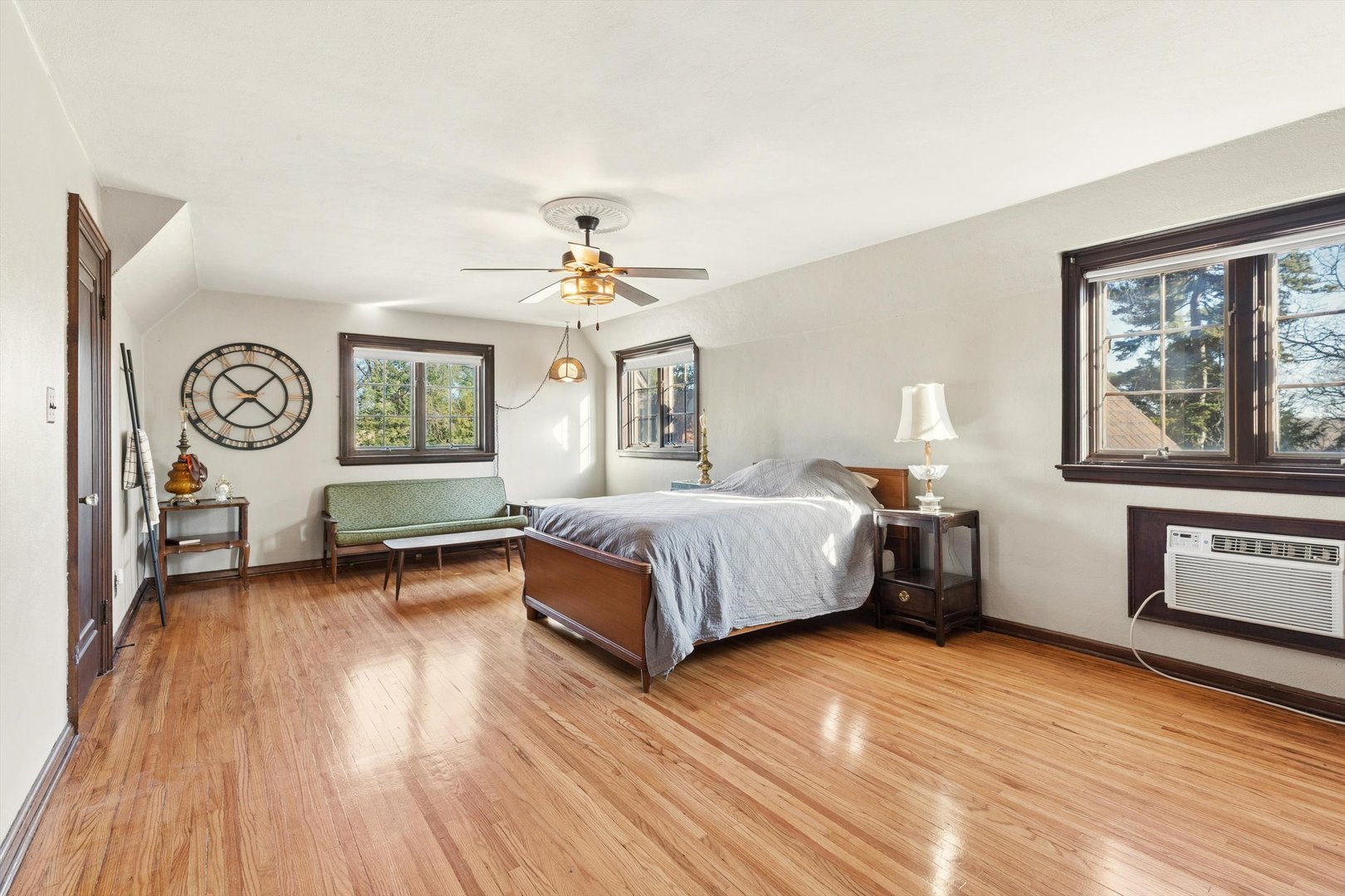 716 Terrace Drive Clinton, IA 52732 - Photo 51 of 78 a spacious bedroom with a bed and a table in it