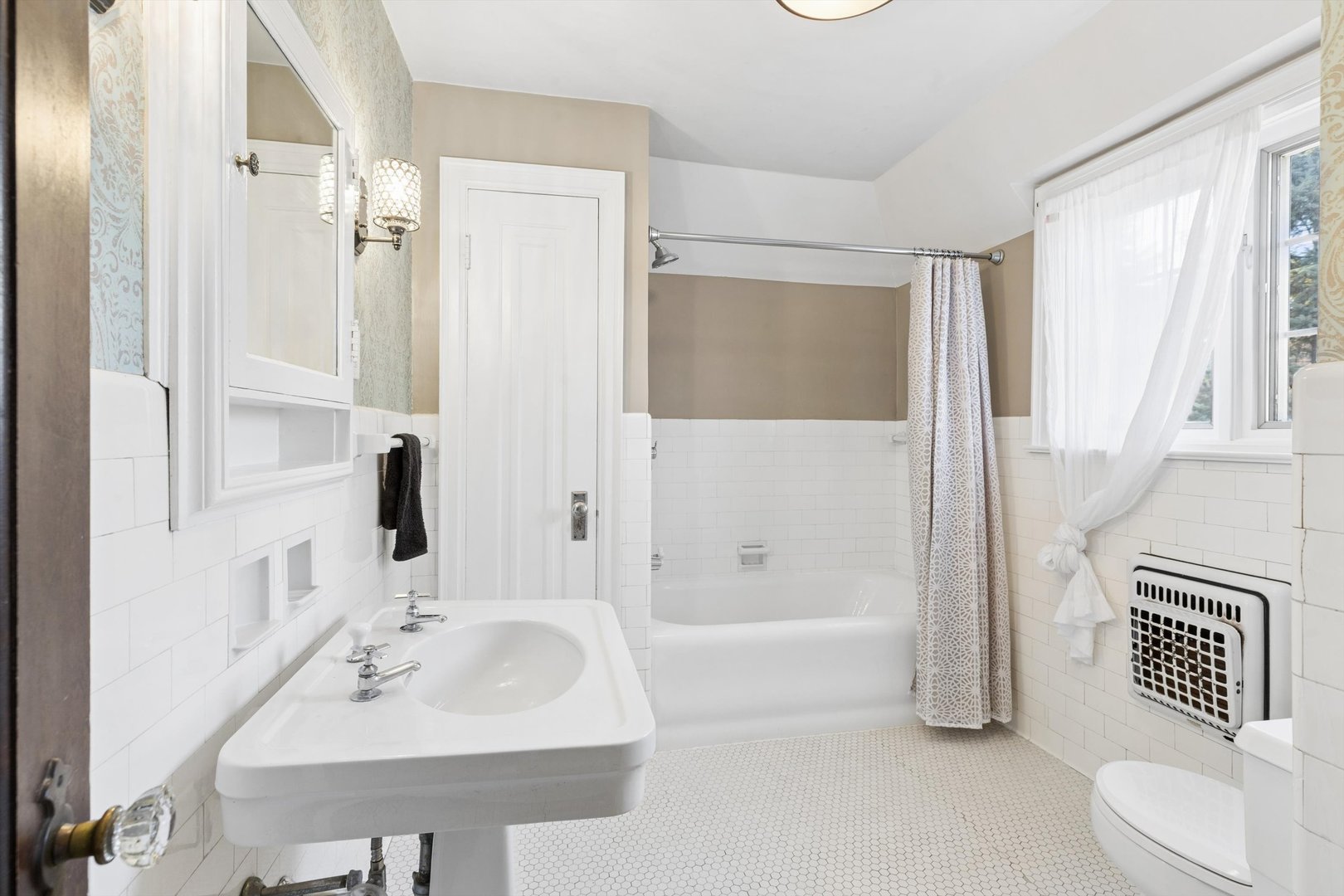 716 Terrace Drive Clinton, IA 52732 - Photo 63 of 78 a bathroom with a sink toilet and shower