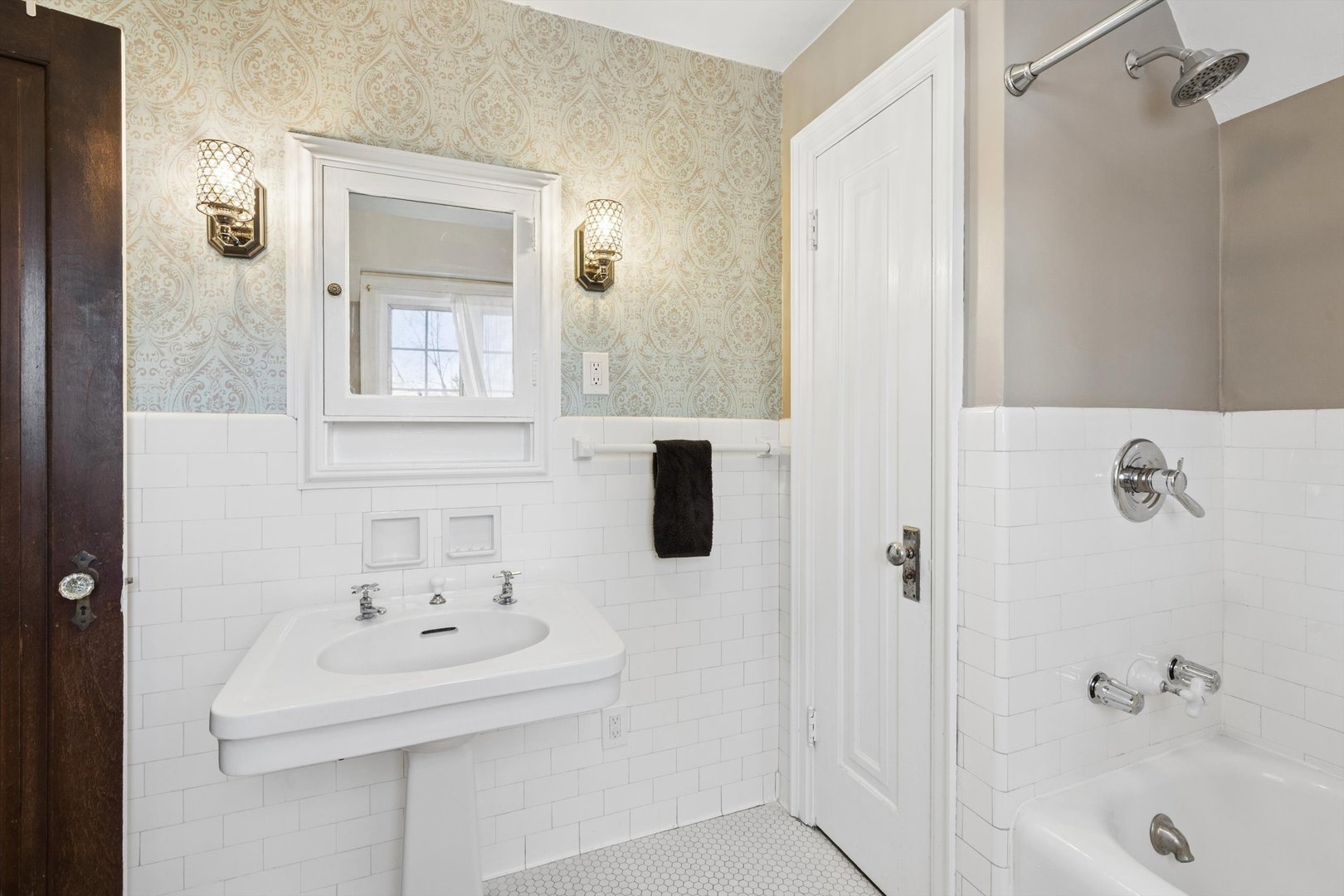 716 Terrace Drive Clinton, IA 52732 - Photo 64 of 78 a bathroom with a sink a toilet and shower