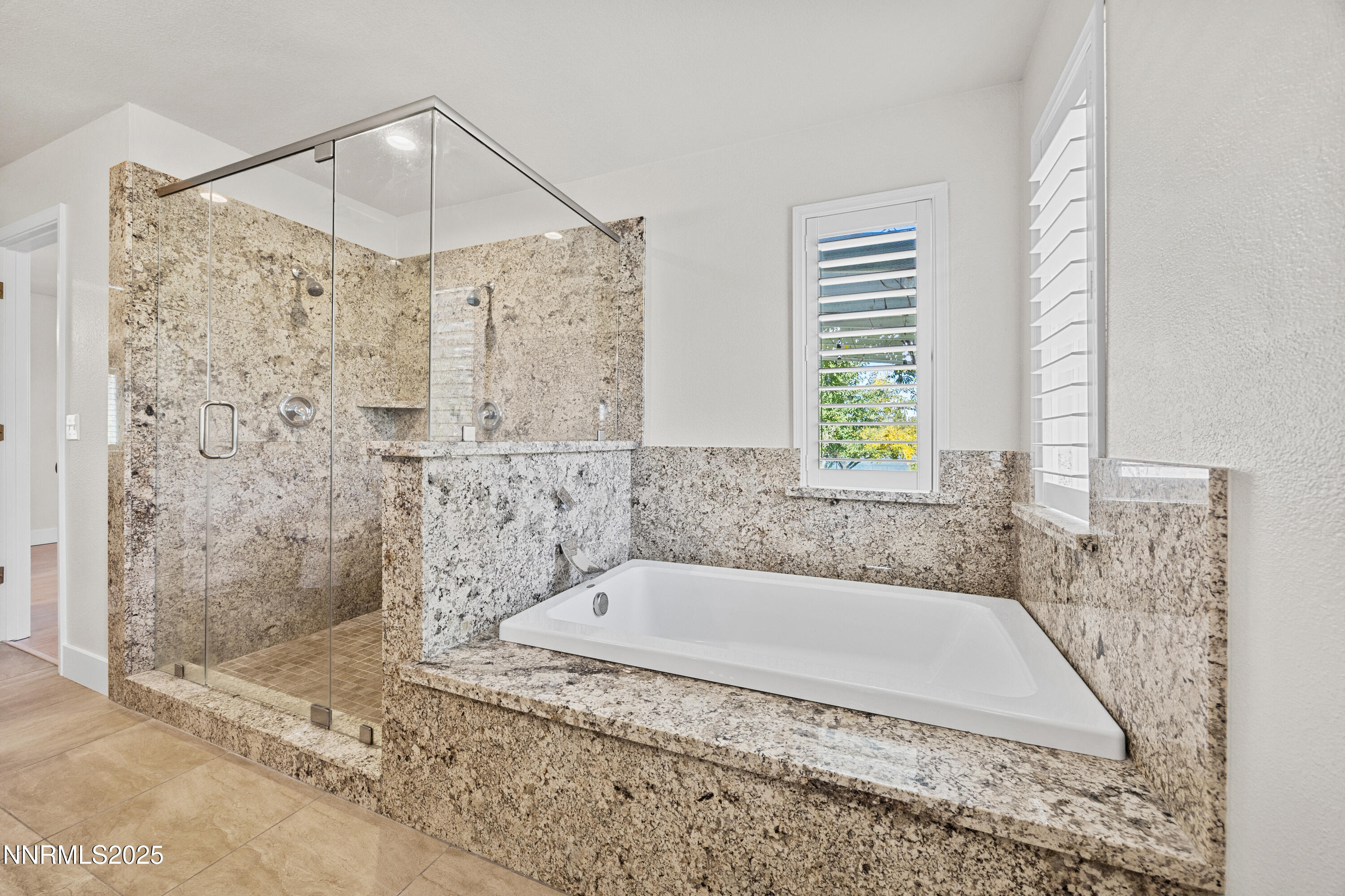 3510 Comstock Drive Reno, NV 89512 - Photo 18 of 37 a bathroom with a bathtub and shower