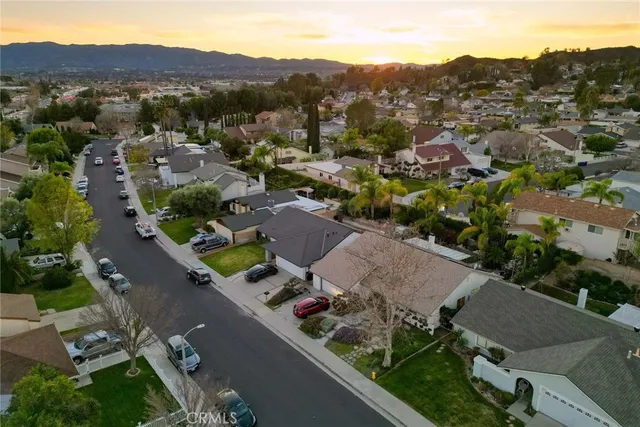 an aerial view of a house with a garden