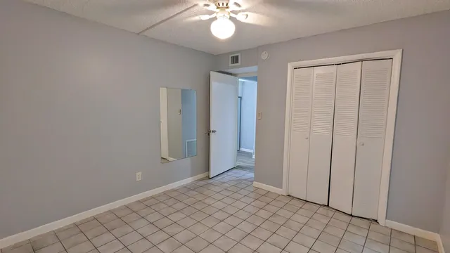 a view of an empty room and window