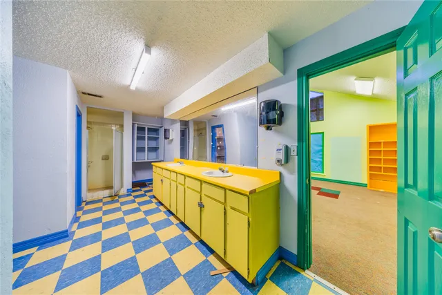 a bathroom with a toilet and a sink