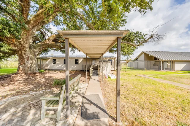 a view of a house with a swimming pool