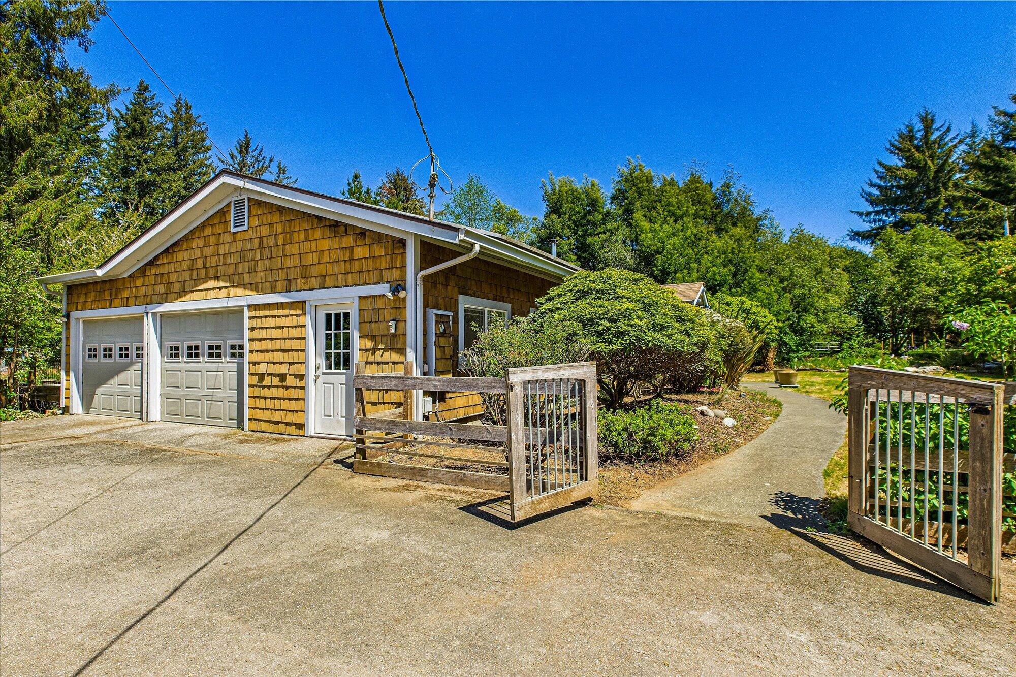 1945 Grange Road McKinleyville, CA 95519 - Photo 5 of 62 a view of a house with wooden fence