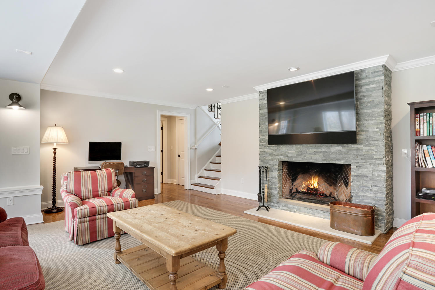 278 Davenport Ridge Road New Canaan, CT 06840 - Photo 11 of 31 a living room with furniture and a fireplace