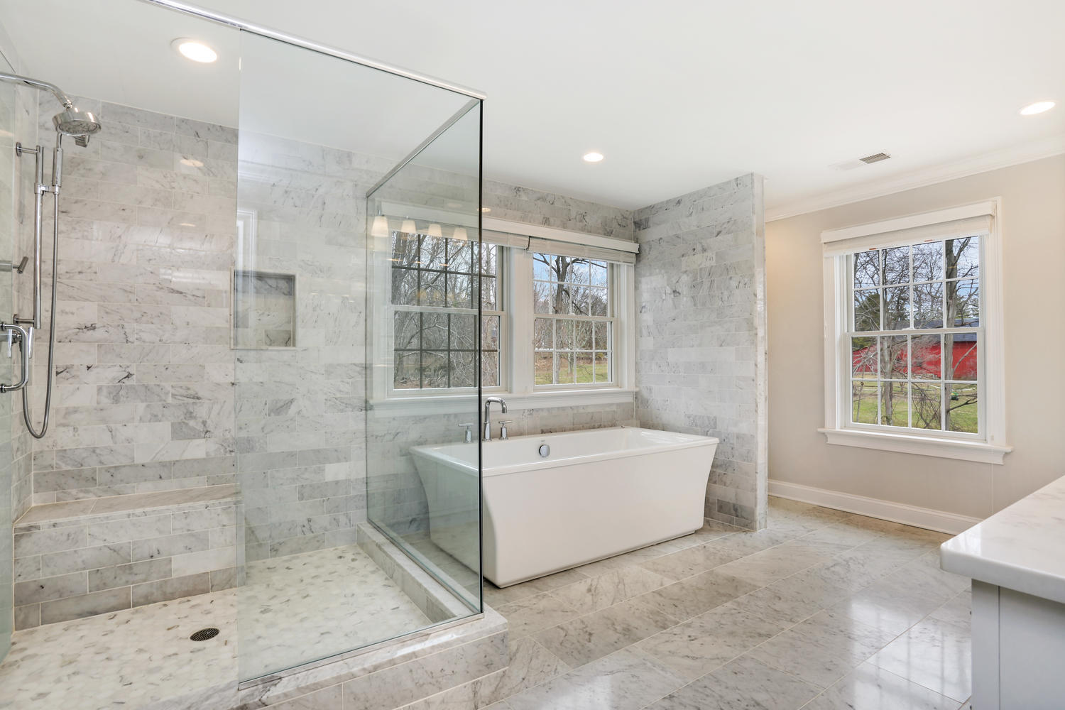 278 Davenport Ridge Road New Canaan, CT 06840 - Photo 19 of 31 a bathroom with a bathtub and a shower