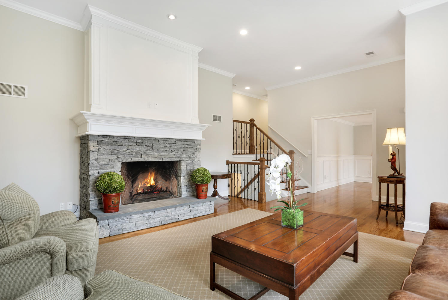 278 Davenport Ridge Road New Canaan, CT 06840 - Photo 3 of 31 a living room with furniture and a fireplace