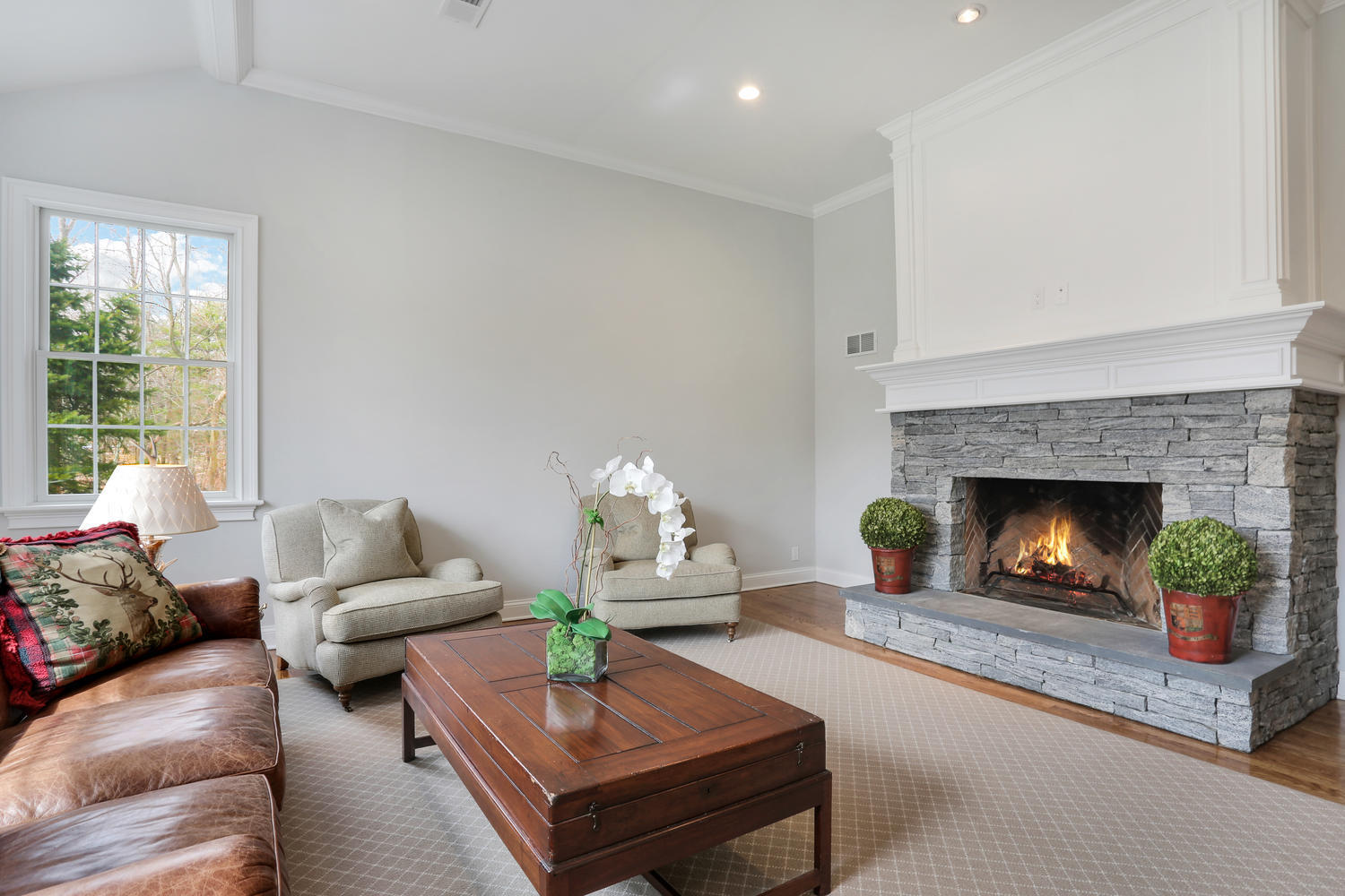 278 Davenport Ridge Road New Canaan, CT 06840 - Photo 4 of 31 a living room with furniture and a fireplace
