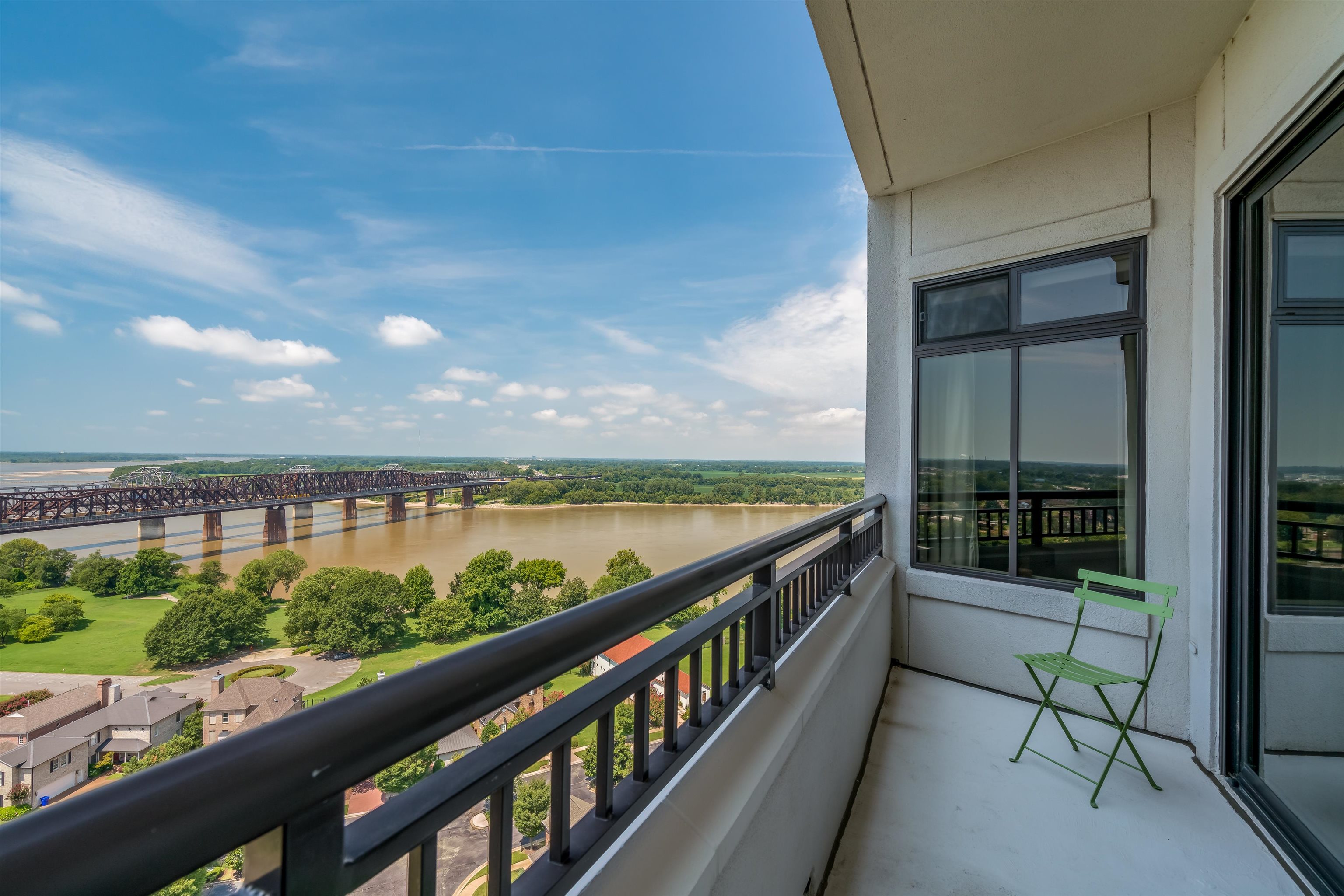 717 Riverside Drive, Unit PH2 Memphis, TN 38103 - Photo 10 of 25 a view of a balcony with wooden floor and outdoor space