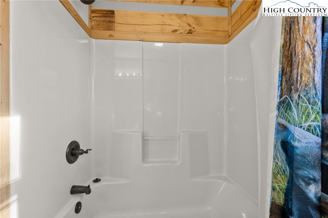 713 River Ridge Road Boone, NC 28607 - Photo 17 of 44 a bathroom with a shower