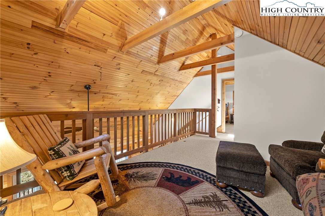 713 River Ridge Road Boone, NC 28607 - Photo 22 of 44 a view of a balcony with furniture