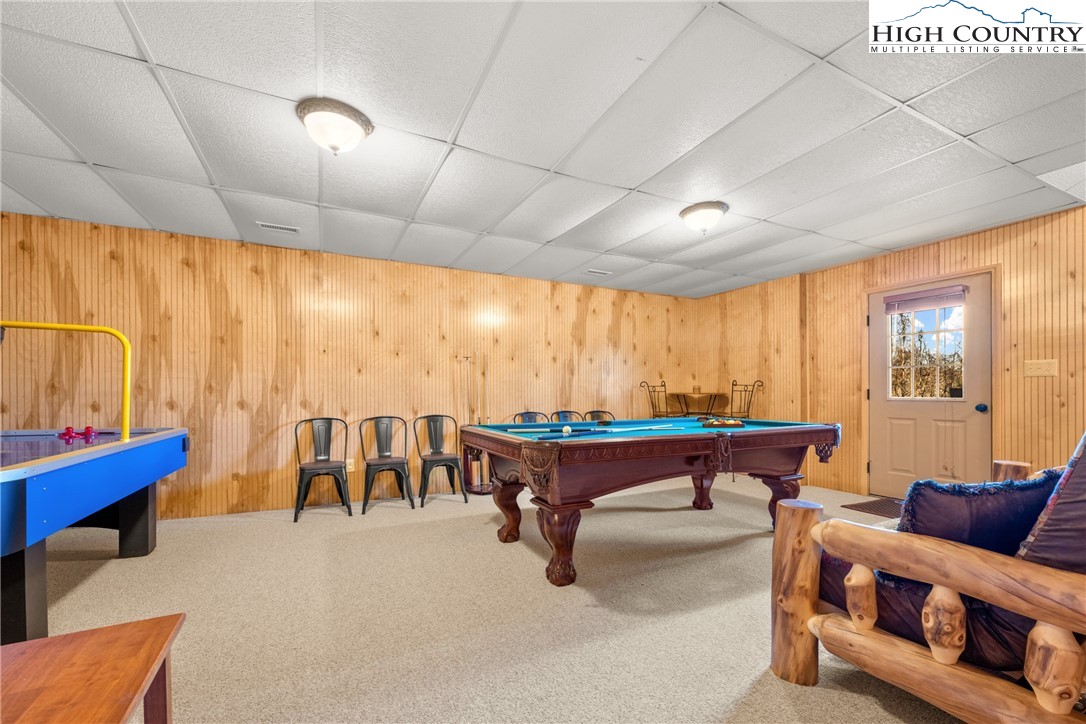 713 River Ridge Road Boone, NC 28607 - Photo 29 of 44 a living room with furniture a large window with kitchen view