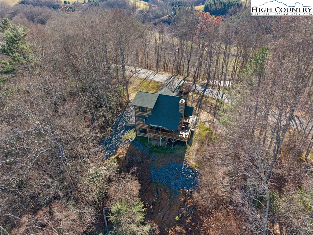 713 River Ridge Road Boone, NC 28607 - Photo 38 of 44 a aerial view of a house with a yard