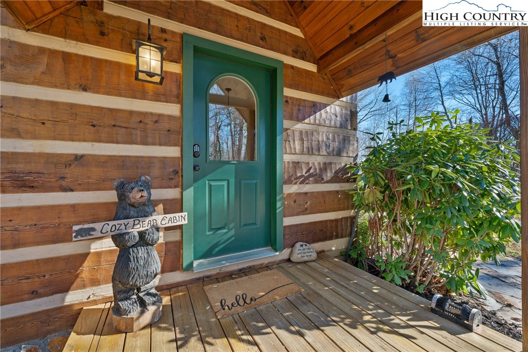 713 River Ridge Road Boone, NC 28607 - Photo 4 of 44 a view of a street with potted plants