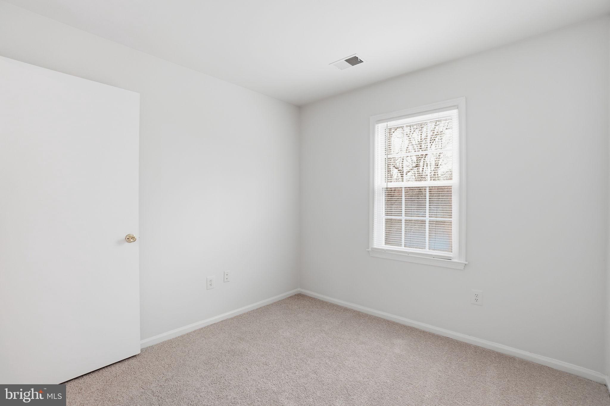 7923 Pebble Brook Court Springfield, VA 22153 - Photo 17 of 34 an empty room with a window