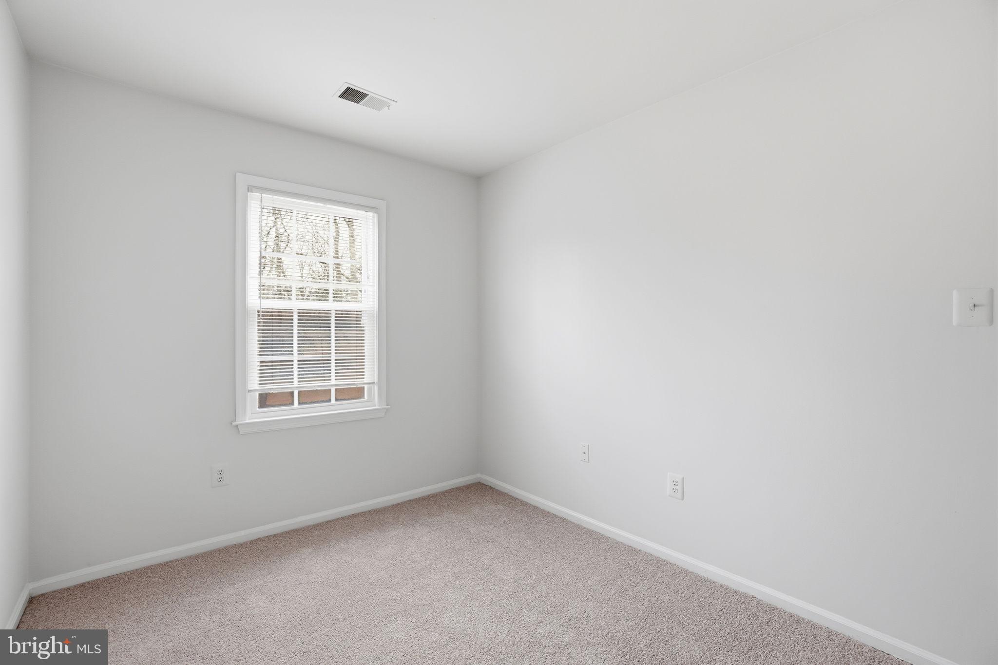 7923 Pebble Brook Court Springfield, VA 22153 - Photo 19 of 34 an empty room with a window