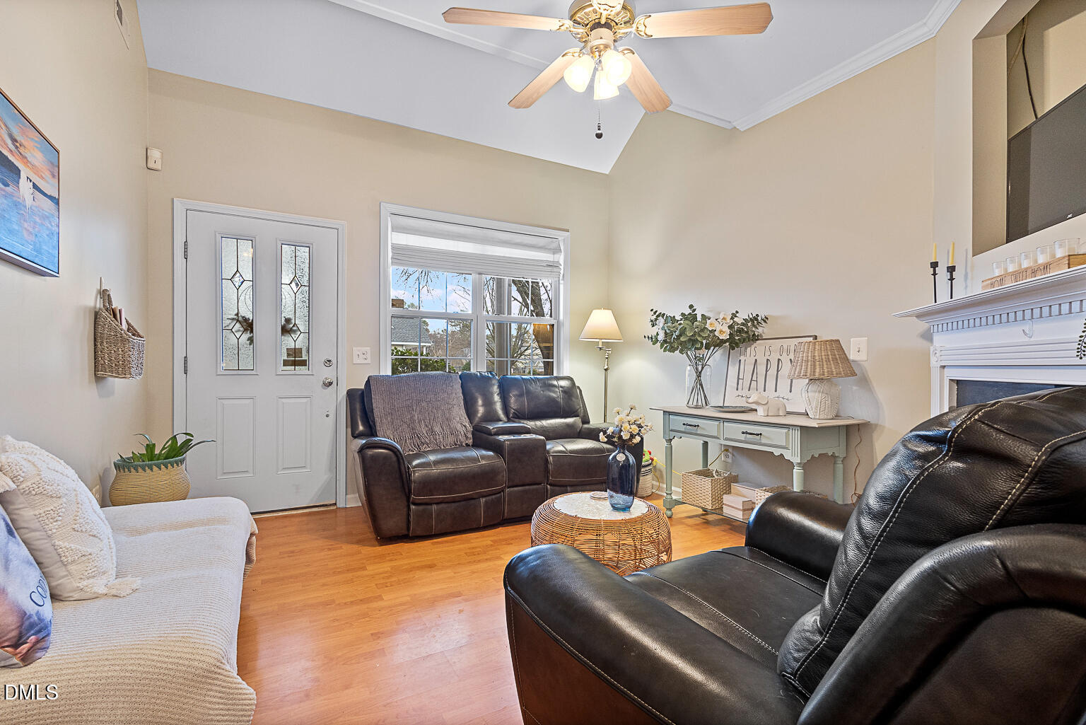 2907 Andover Glen Road Raleigh, NC 27604 - Photo 7 of 39 a living room with furniture and a fireplace