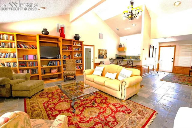 a living room with furniture and decor