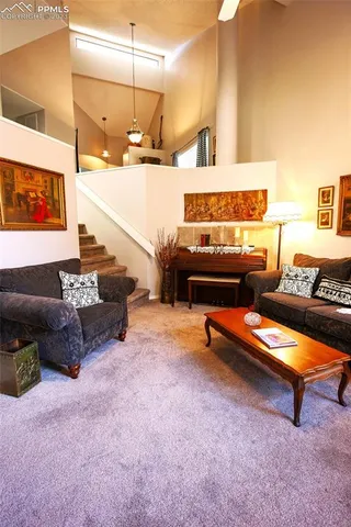 a living room with furniture and a couch