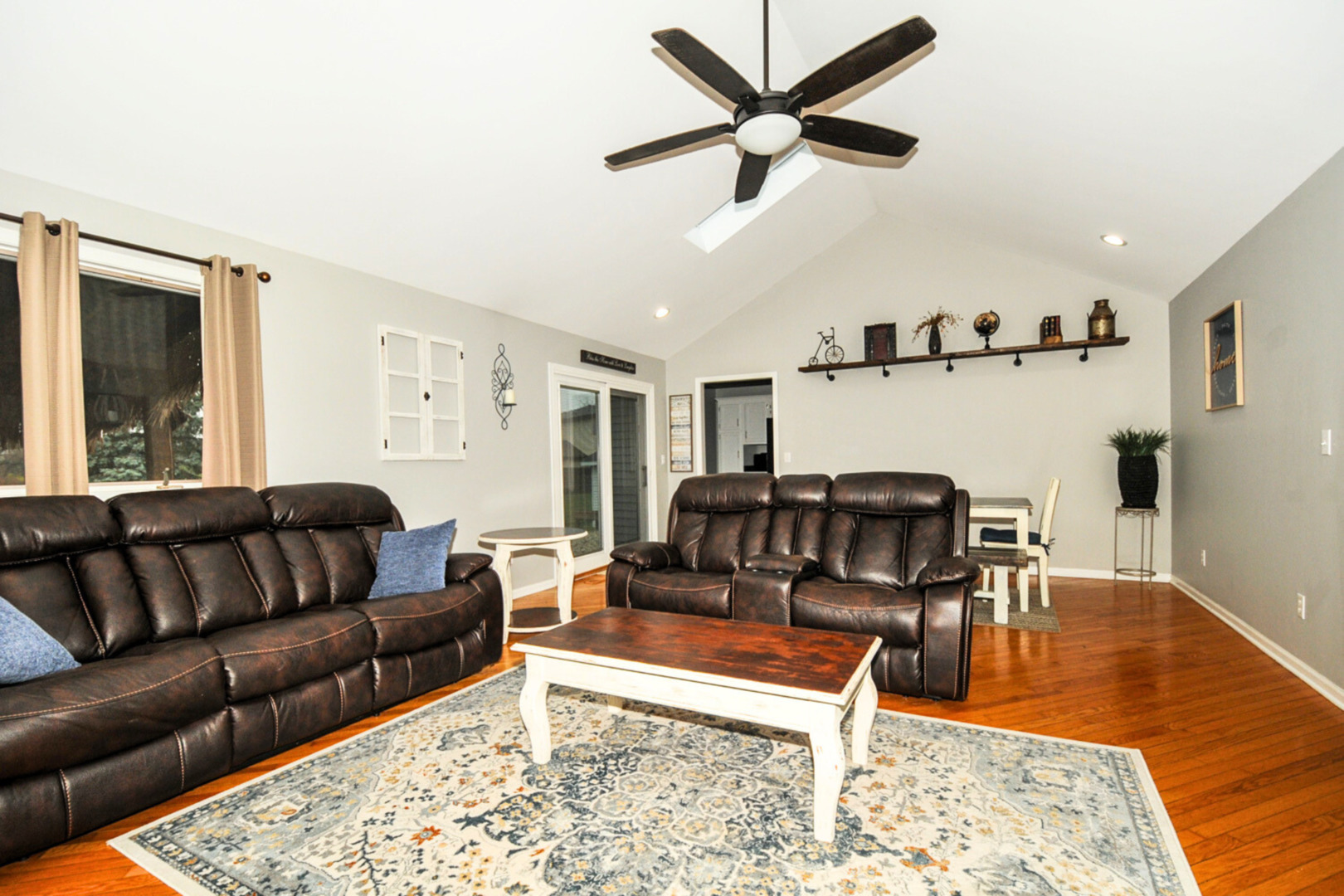 809 Longlane Road New Lenox, IL 60451 - Photo 3 of 22 a living room with furniture ceiling fan and a rug
