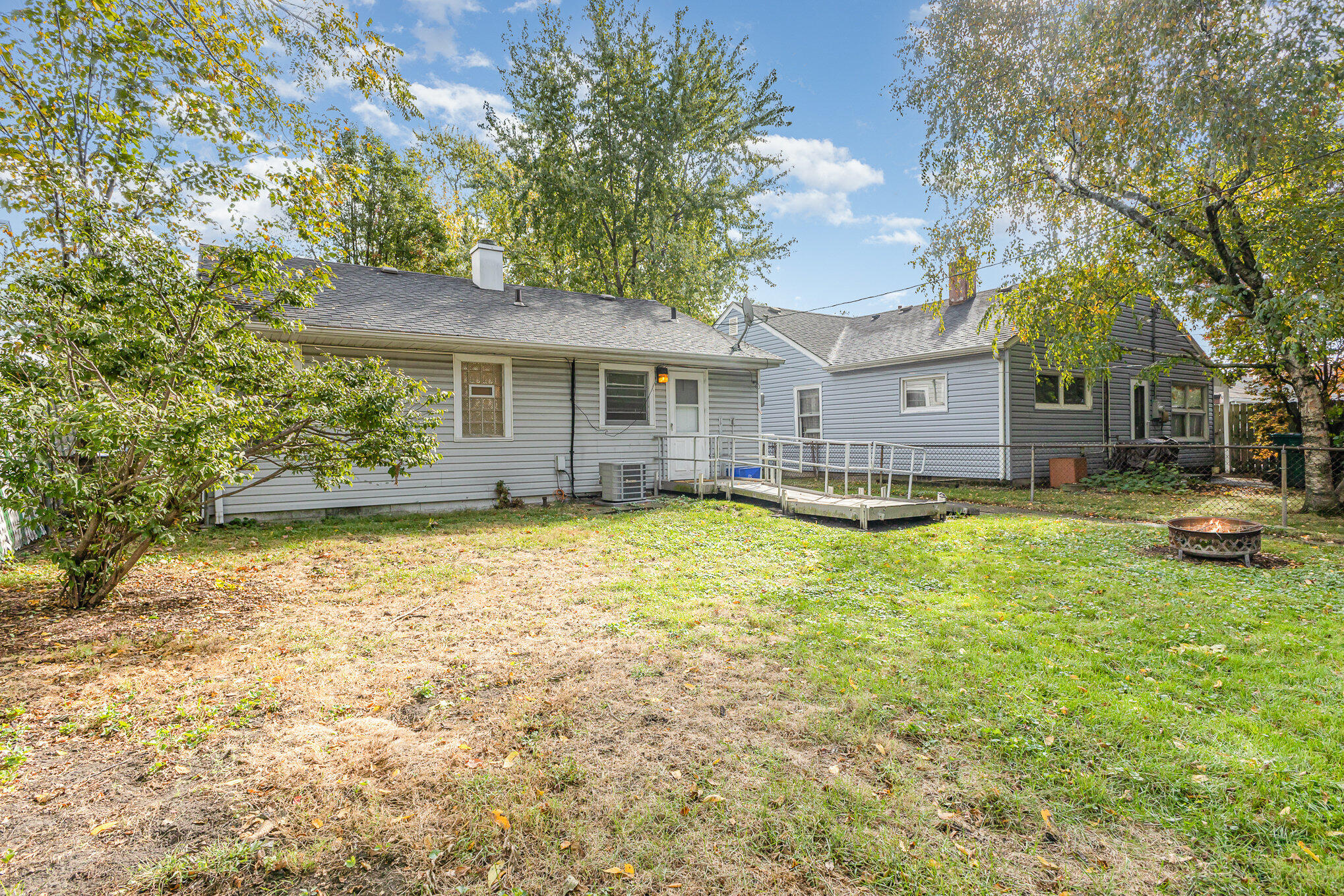 7536 Harrison Avenue Hammond, IN 46324 - Photo 14 of 16 a view of a house with swimming pool and sitting area
