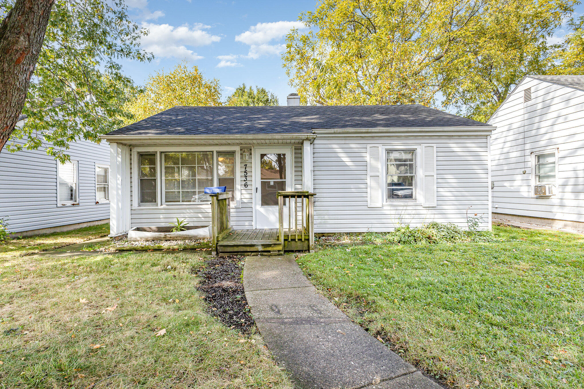 7536 Harrison Avenue Hammond, IN 46324 - Photo 16 of 16 a front view of a house with garden