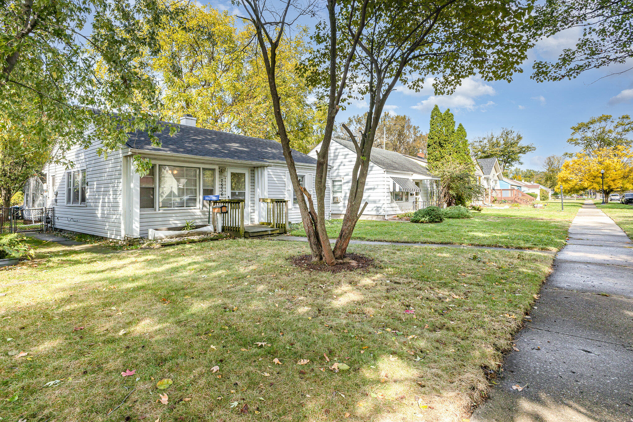 7536 Harrison Avenue Hammond, IN 46324 - Photo 2 of 16 a view of a house with backyard and tree