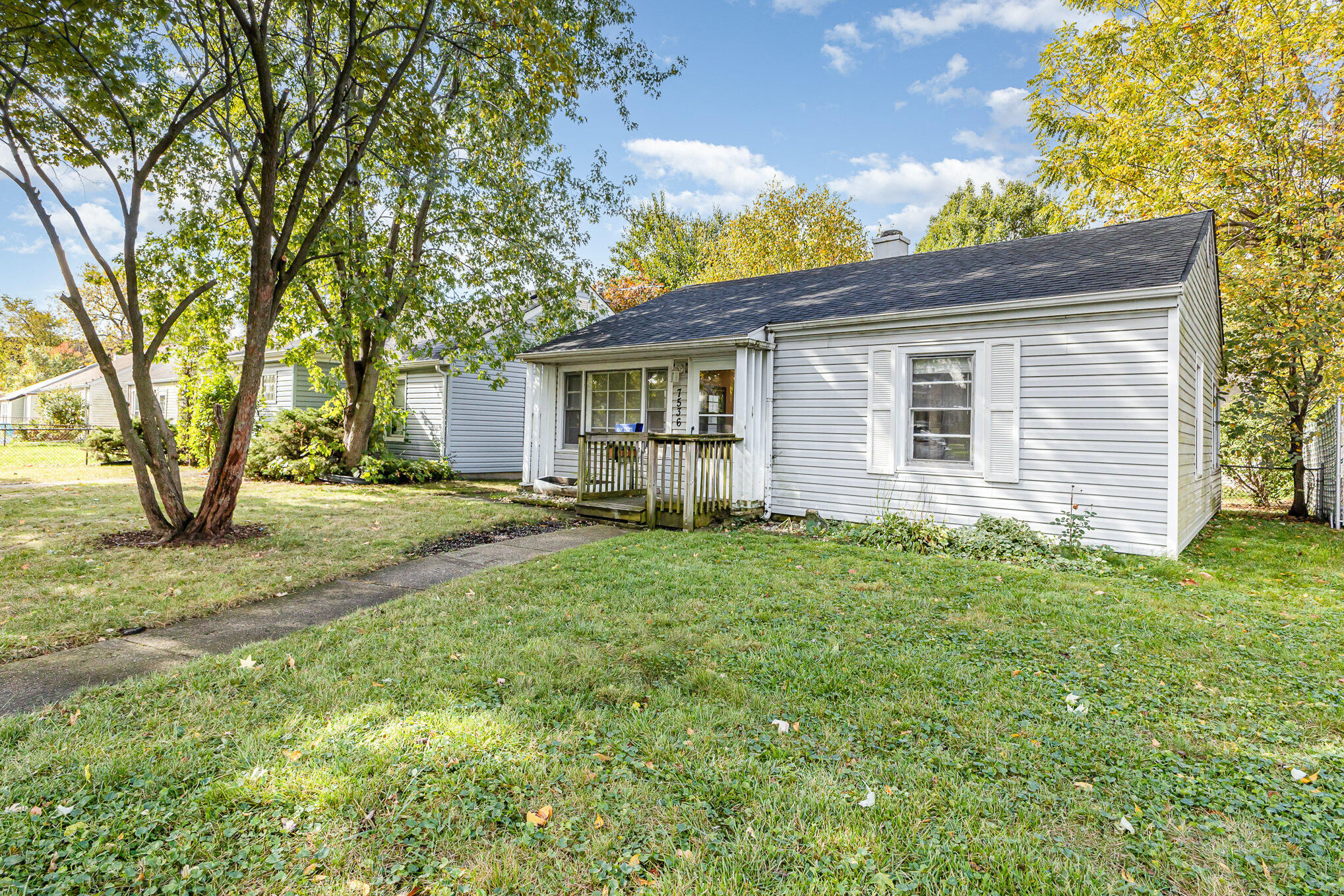 7536 Harrison Avenue Hammond, IN 46324 - Photo 3 of 16 a backyard of a house with seating space