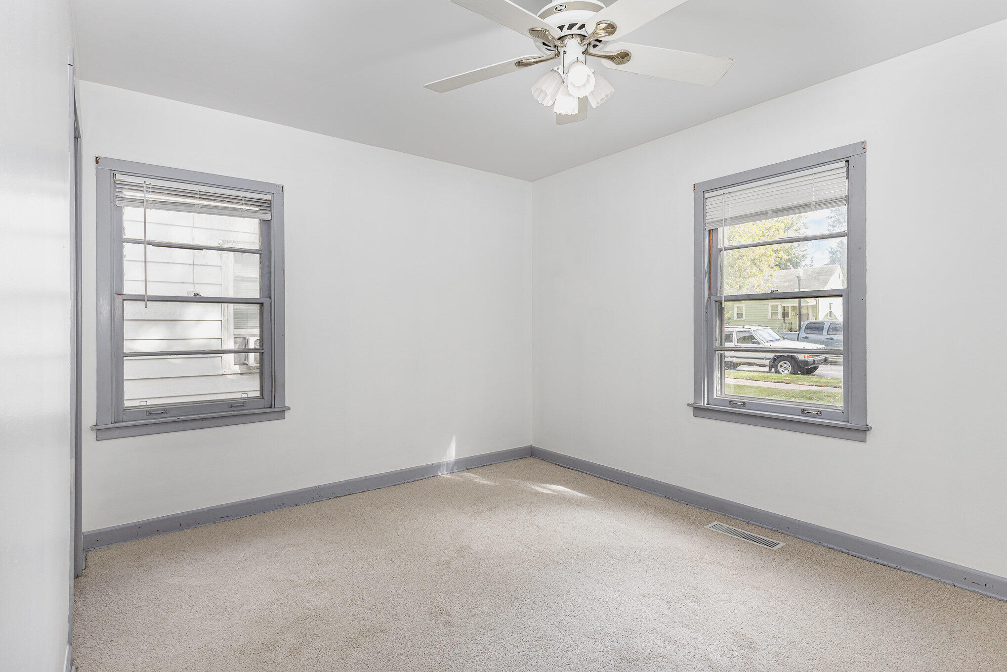 7536 Harrison Avenue Hammond, IN 46324 - Photo 8 of 16 a view of an empty room with a window