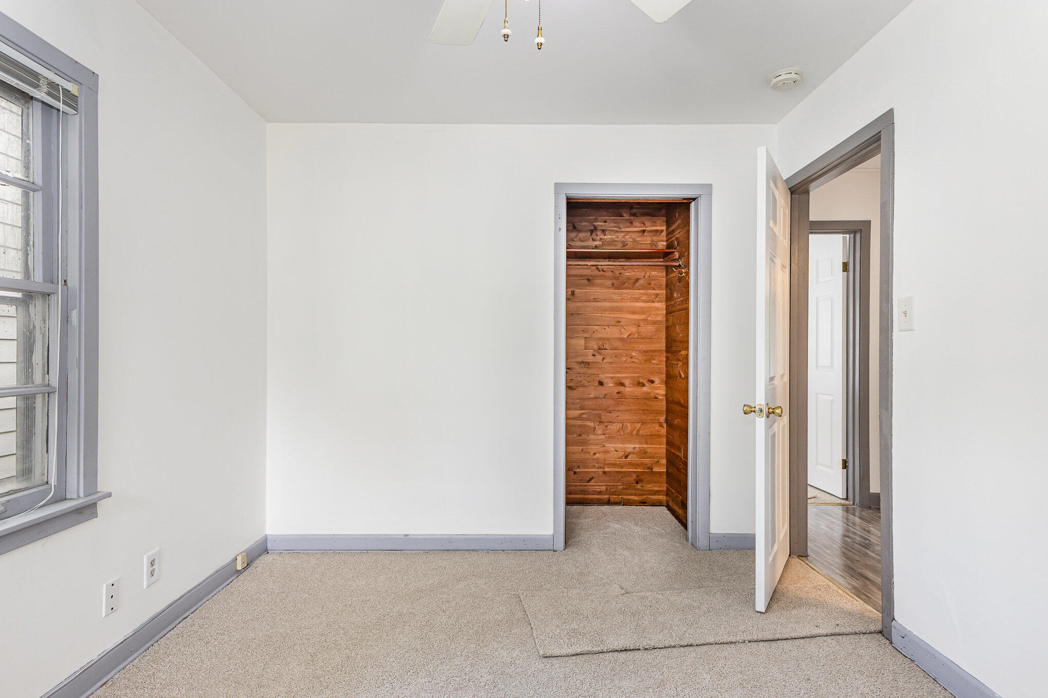 7536 Harrison Avenue Hammond, IN 46324 - Photo 10 of 16 an empty room with window in front of door