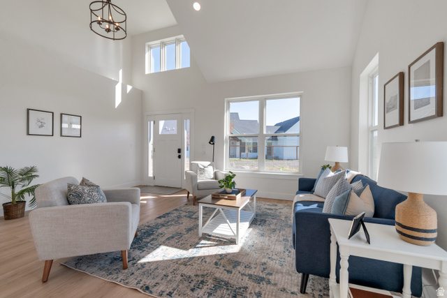 1820 West Farmhouse Flats Road Peoa, UT 84061 - Photo 60 of 79 Vaulted ceilings with an overhead chandelier and recessed lighting