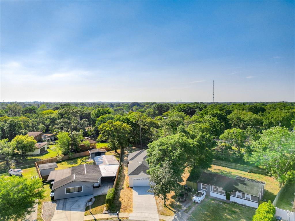 10424 Groton Street Orlando, FL 32817 - Photo 1 of 1 an aerial view of residential house with outdoor space