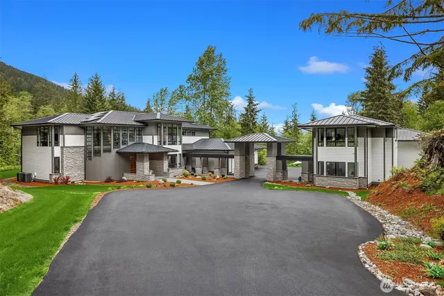 front view of a house with a yard