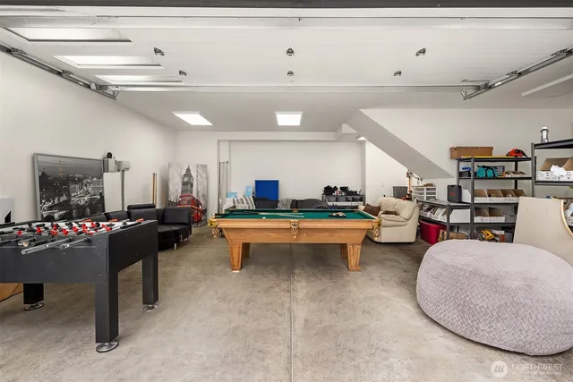 a living room with lots of furniture and a table