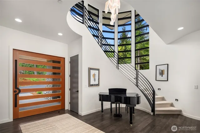 a view of entryway with wooden floor