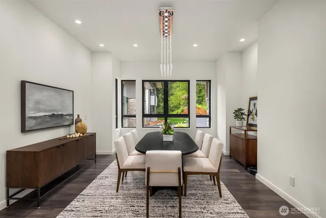 a dining room with furniture and window