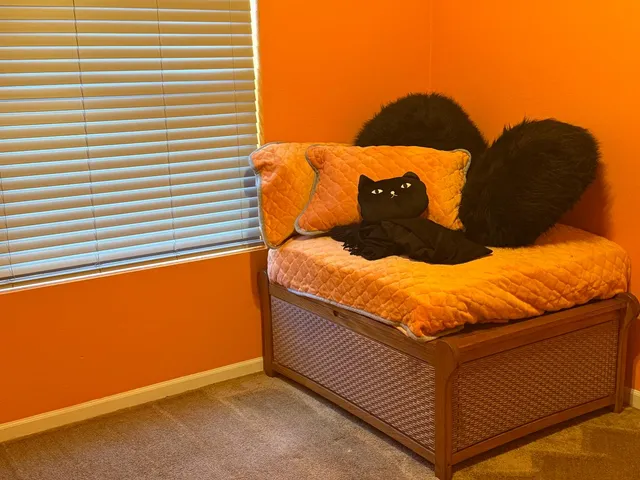 a view of a hallway with wooden floor and stairs