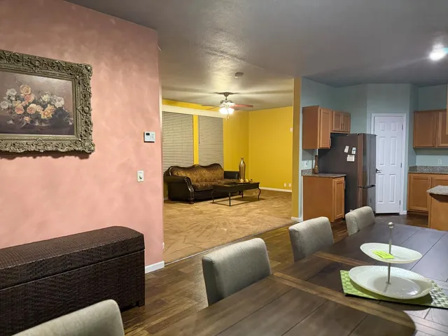 a view of a dining room with furniture