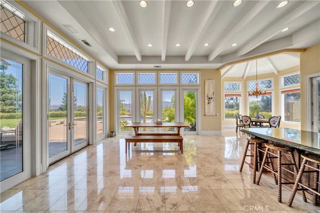 43744 Calle De Velardo Temecula, CA 92592 - Photo 13 of 60 a lobby with furniture and large windows