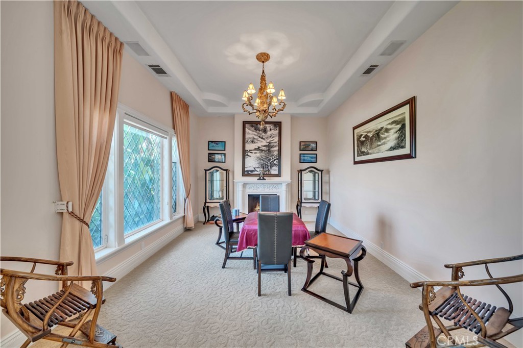 43744 Calle De Velardo Temecula, CA 92592 - Photo 18 of 60 a living room with furniture and a large window