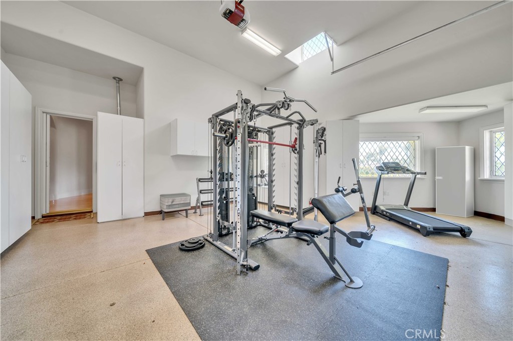 43744 Calle De Velardo Temecula, CA 92592 - Photo 21 of 60 a view of a room with gym equipment