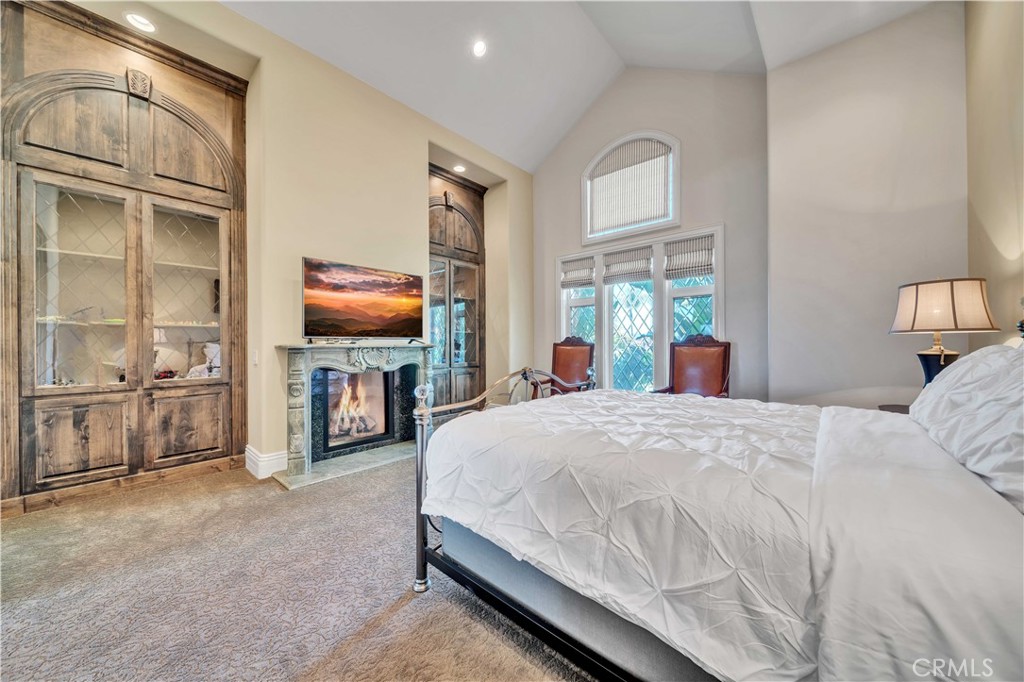 43744 Calle De Velardo Temecula, CA 92592 - Photo 27 of 60 a bedroom with a bed and a flat screen tv