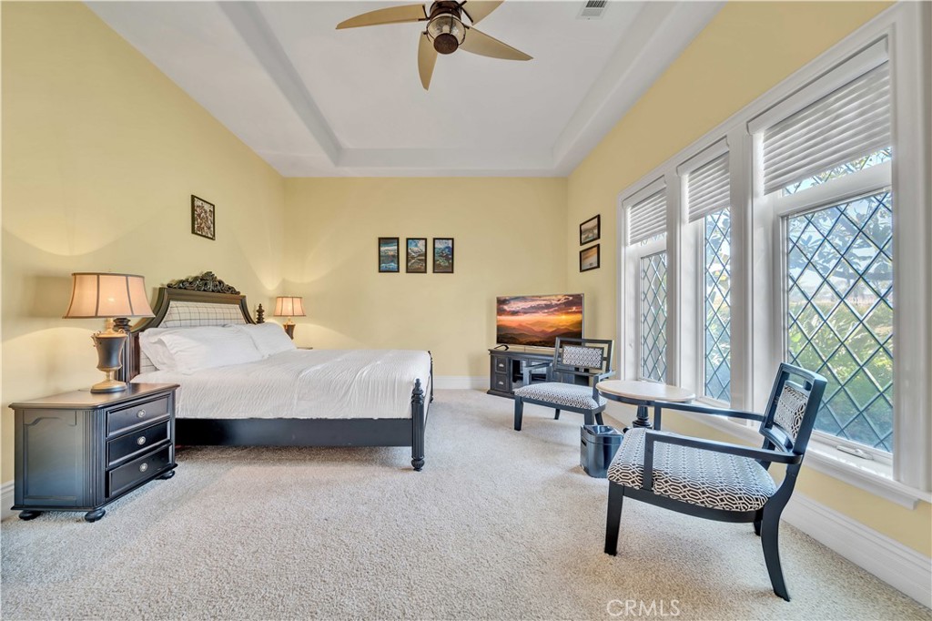 43744 Calle De Velardo Temecula, CA 92592 - Photo 28 of 60 a bedroom with furniture and a window