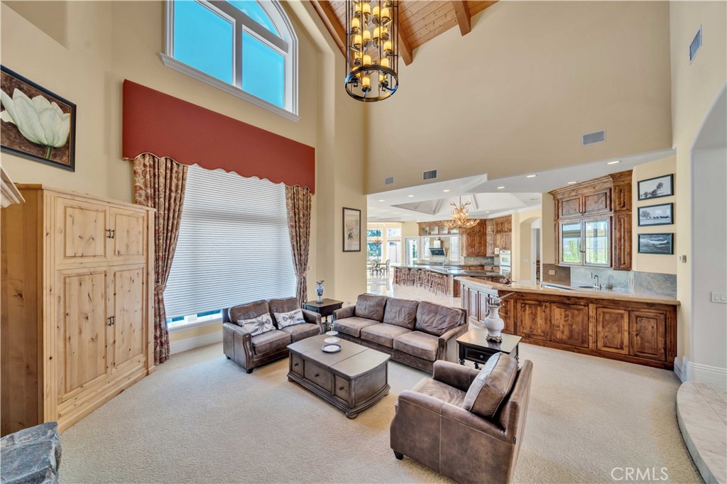43744 Calle De Velardo Temecula, CA 92592 - Photo 4 of 60 a living room with furniture and a large window