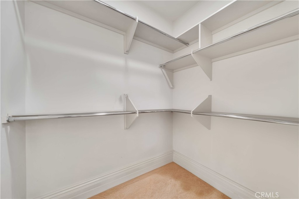 43744 Calle De Velardo Temecula, CA 92592 - Photo 41 of 60 a view of an empty walk in closet