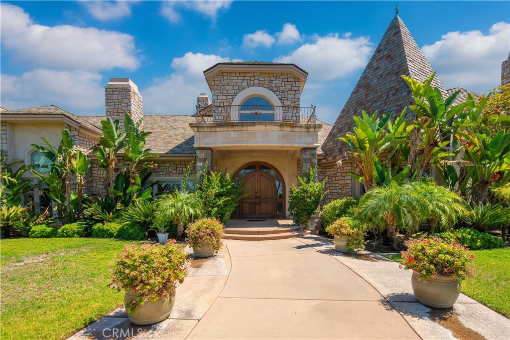 43744 Calle De Velardo Temecula, CA 92592 - Photo 48 of 60 a front view of a house with a garden